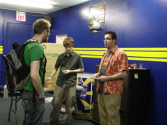 While Jordan explains the experiment, Scott does a little jig in the background.
